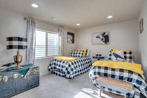 Bedroom featuring carpet floors and recessed lighting