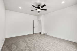 Unfurnished room with recessed lighting, carpet floors, and ceiling fan