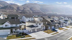 View of mountain backdrop with nearby suburban area