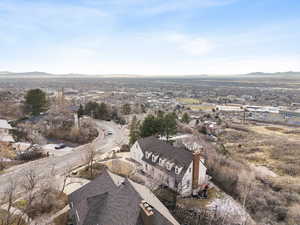 Aerial perspective of suburban area featuring a mountain backdrop