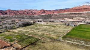 View of mountain background featuring rural landscape