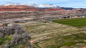 View of mountain backdrop with rural landscape