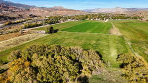 Aerial view of sparsely populated area featuring a mountainous background