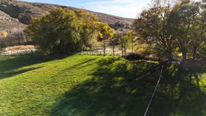 View of yard with a mountain view