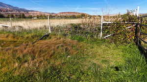 View of yard with a mountain view and a view of countryside