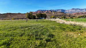 View of mountain background featuring rural landscape