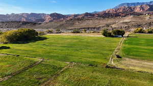 View of mountain background featuring rural landscape and agricultural land