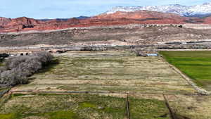 View of mountain background featuring rural landscape
