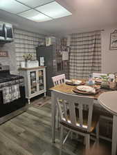 Dining area with wood finished floors