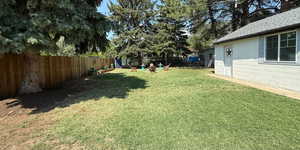 View of fenced backyard