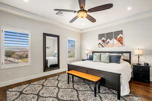 Bedroom with dark wood-style flooring, a ceiling fan, and recessed lighting