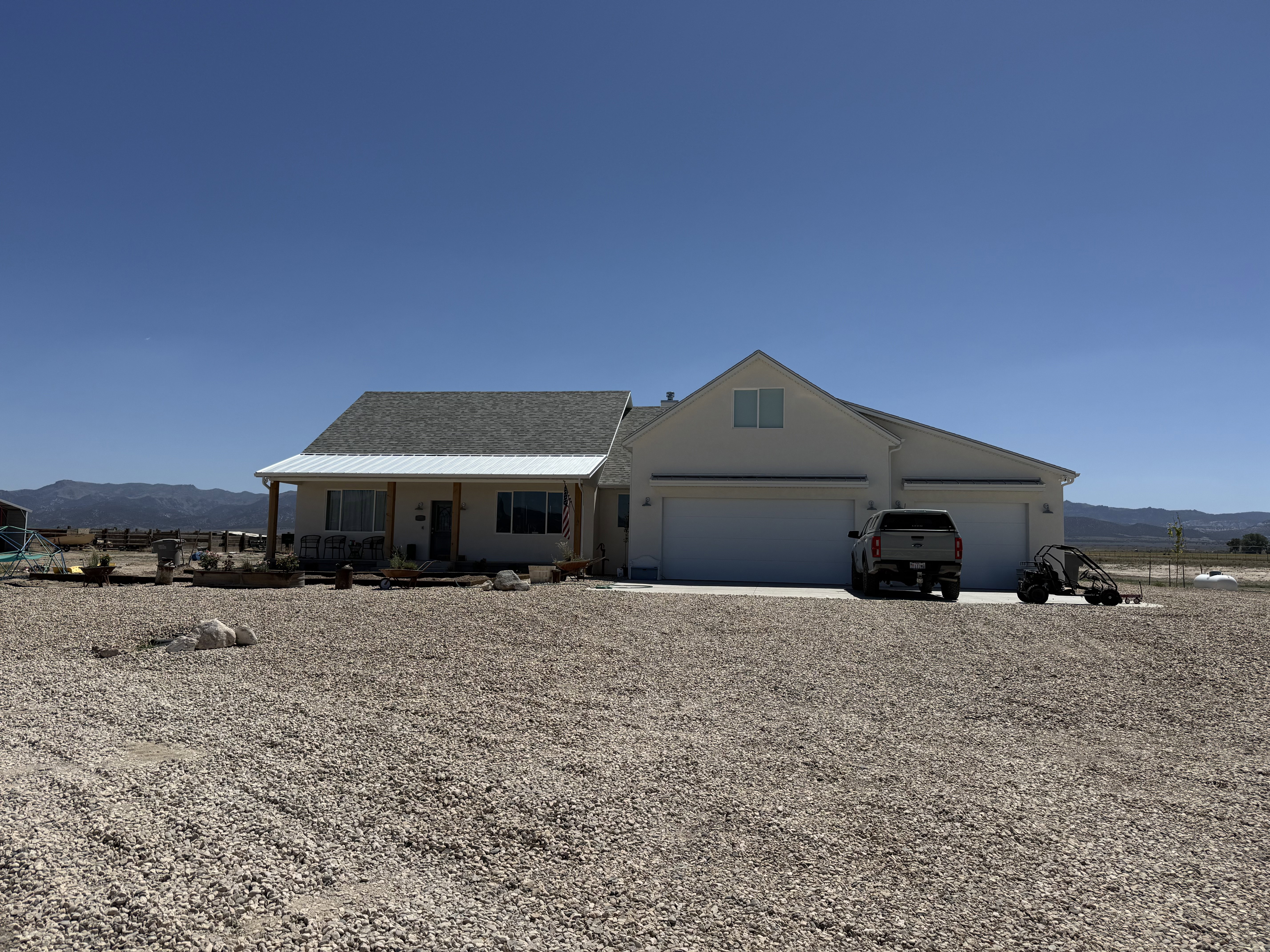 Ranch-style residence featuring a prominent two-car garage