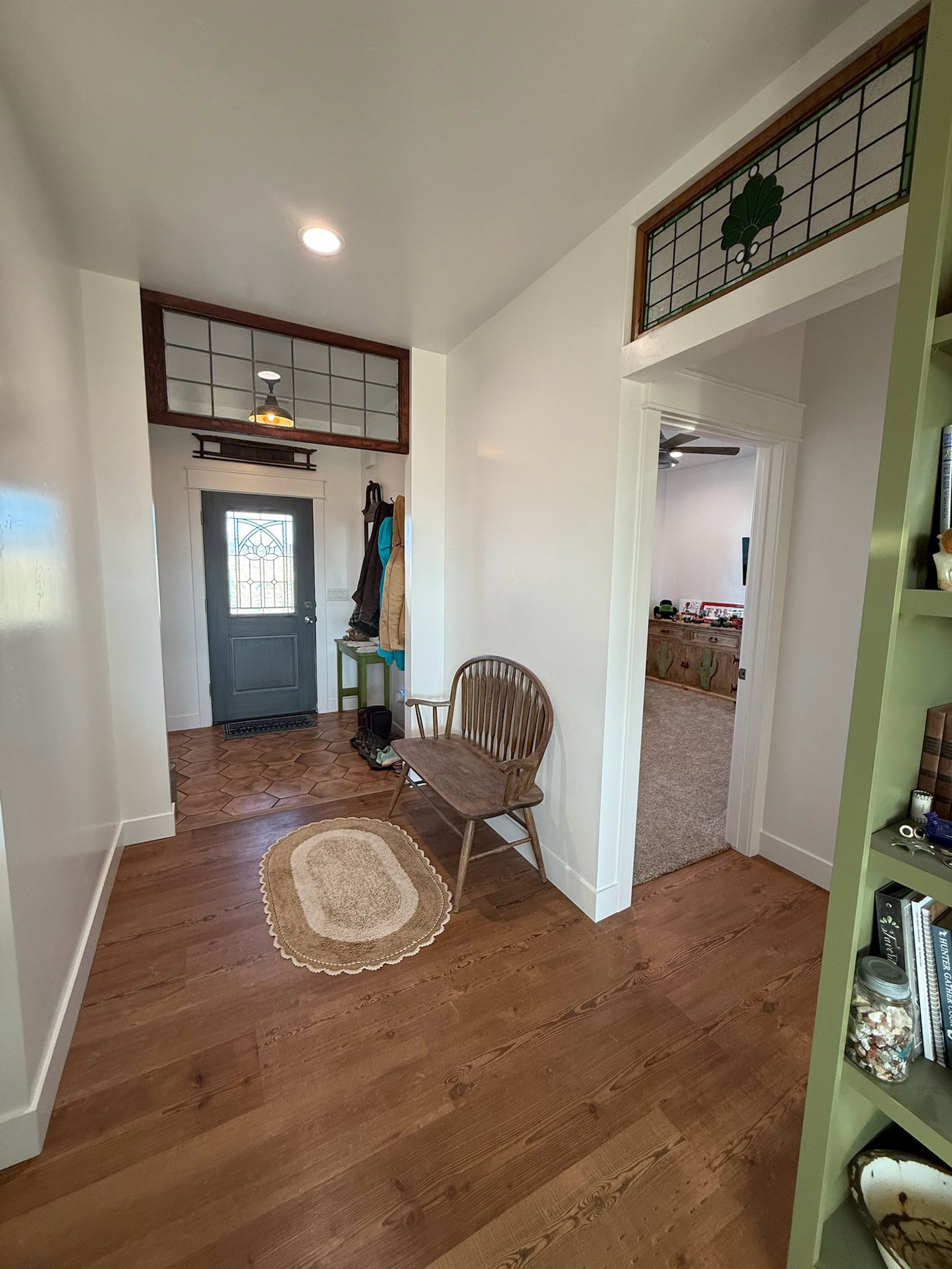 Inviting entryway featuring warm wood-finish flooring