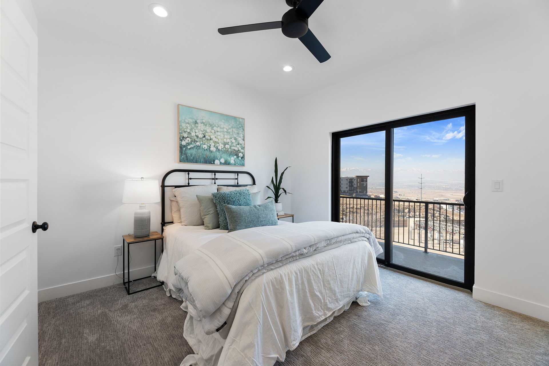 Carpeted bedroom featuring access to outside, ceiling fan, and recessed lighting