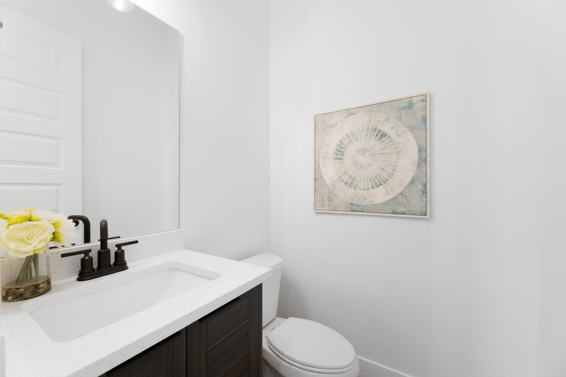 Half bath with vanity and toilet