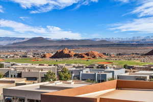 View of mountain backdrop featuring a golf club