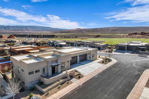 Aerial view of residential area with a mountainous background