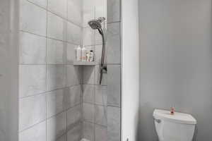 Bathroom with tiled shower