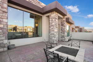 View of patio with outdoor dining area