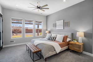 Bedroom featuring carpet floors, a ceiling fan, and recessed lighting