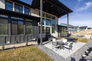 View of patio / terrace featuring a fire pit and outdoor dining space