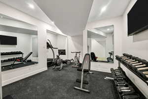 Workout room with recessed lighting