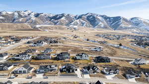 View of mountain background featuring nearby suburban area