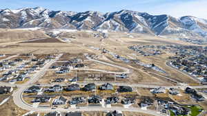 Aerial view of residential area with a mountainous background