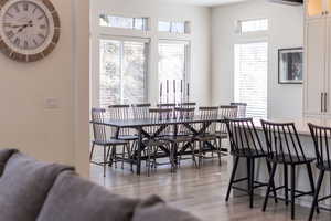 Dining area with light wood-type flooring