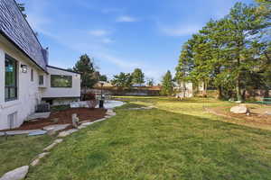 Fenced backyard featuring a patio