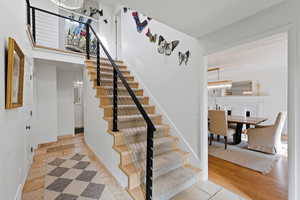 Stairs featuring baseboards