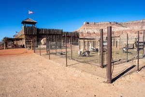 View of yard with an outdoor structure and an exterior structure