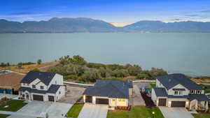 Aerial view at dusk of a water and mountain view