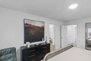 Bedroom featuring connected bathroom