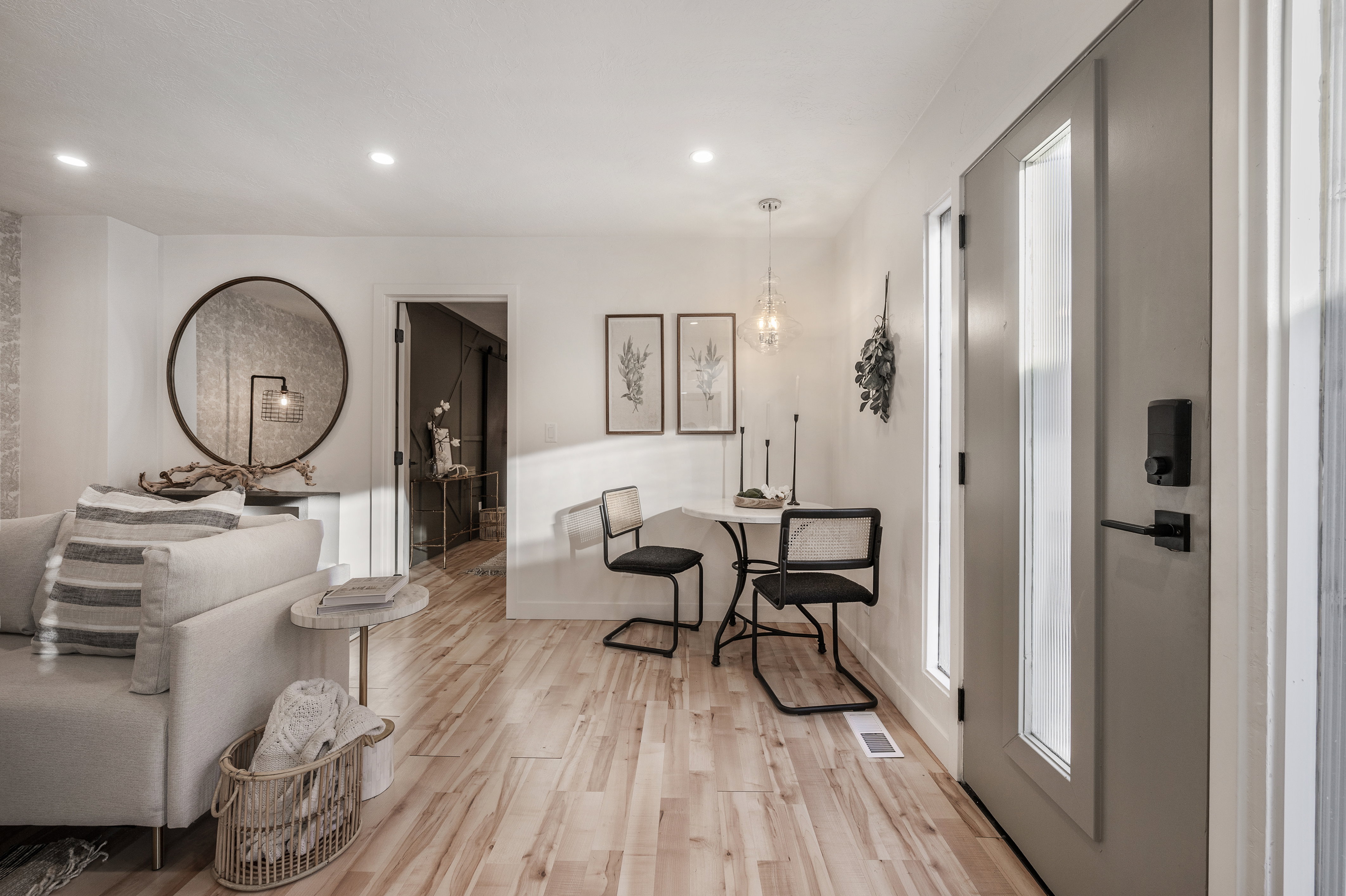Interior space with light wood-style flooring and recessed lighting