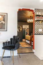 Bedroom featuring a chandelier
