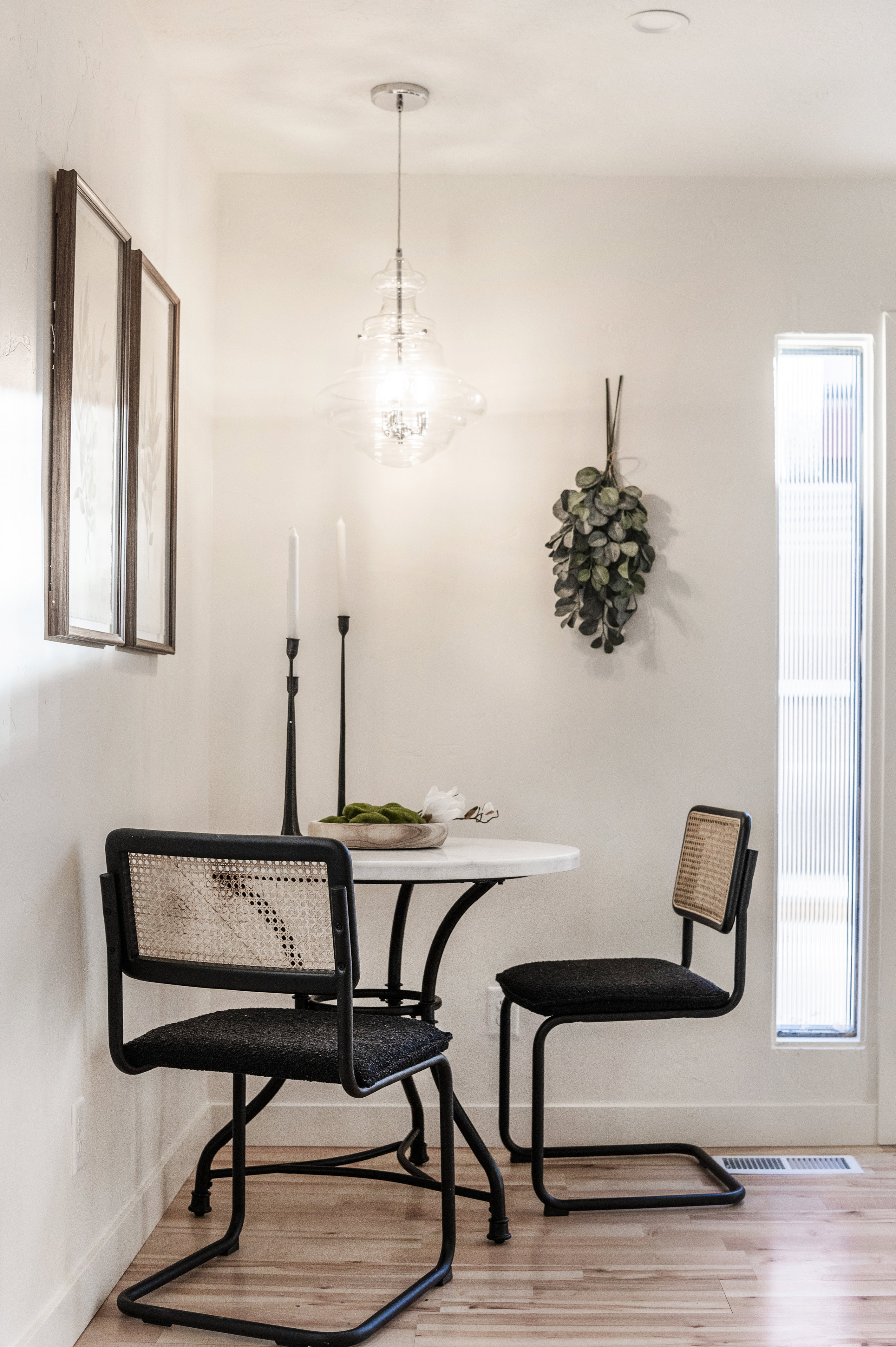 Dining room with light wood finished floors and baseboards