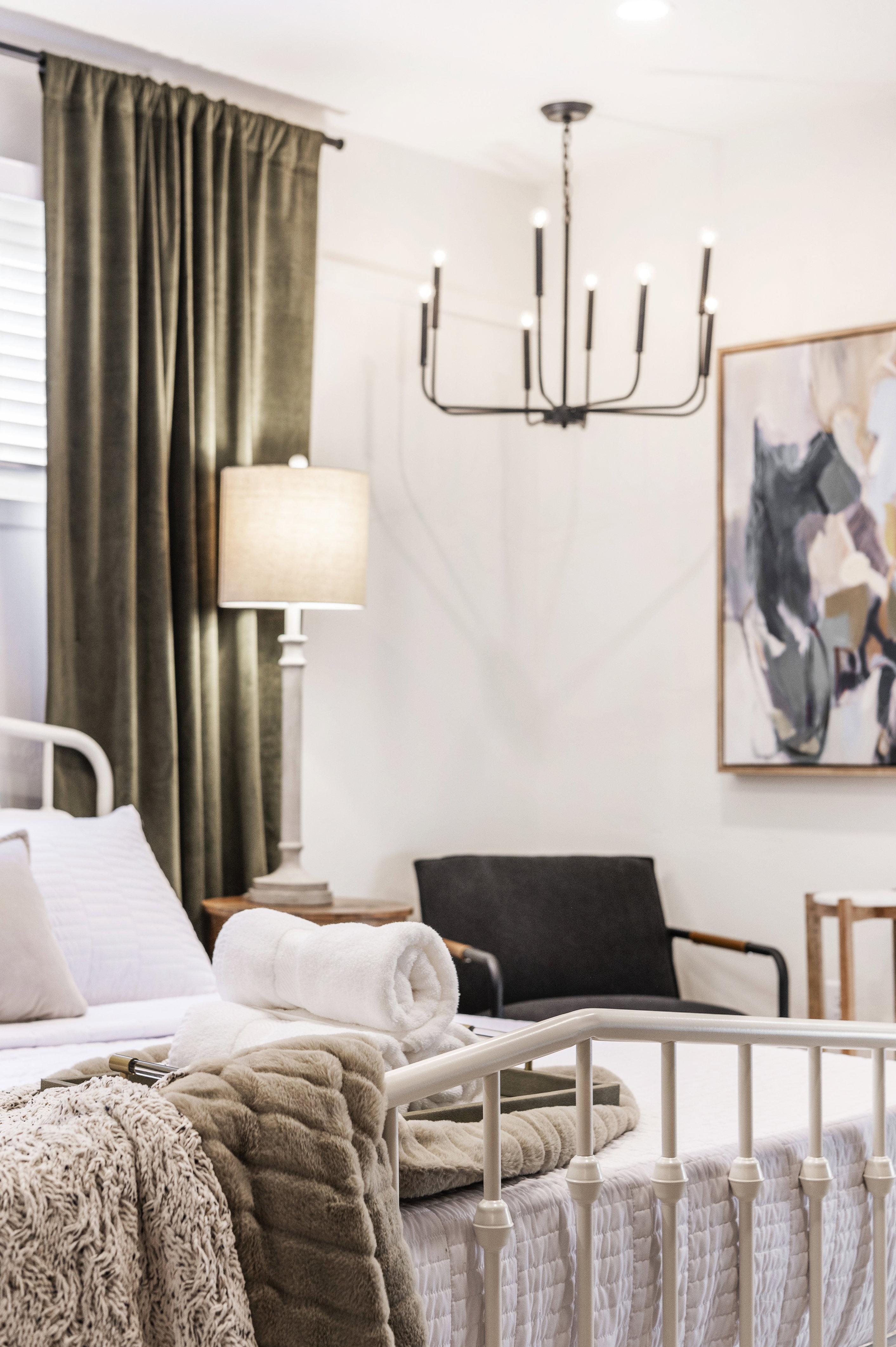 Bedroom with a chandelier