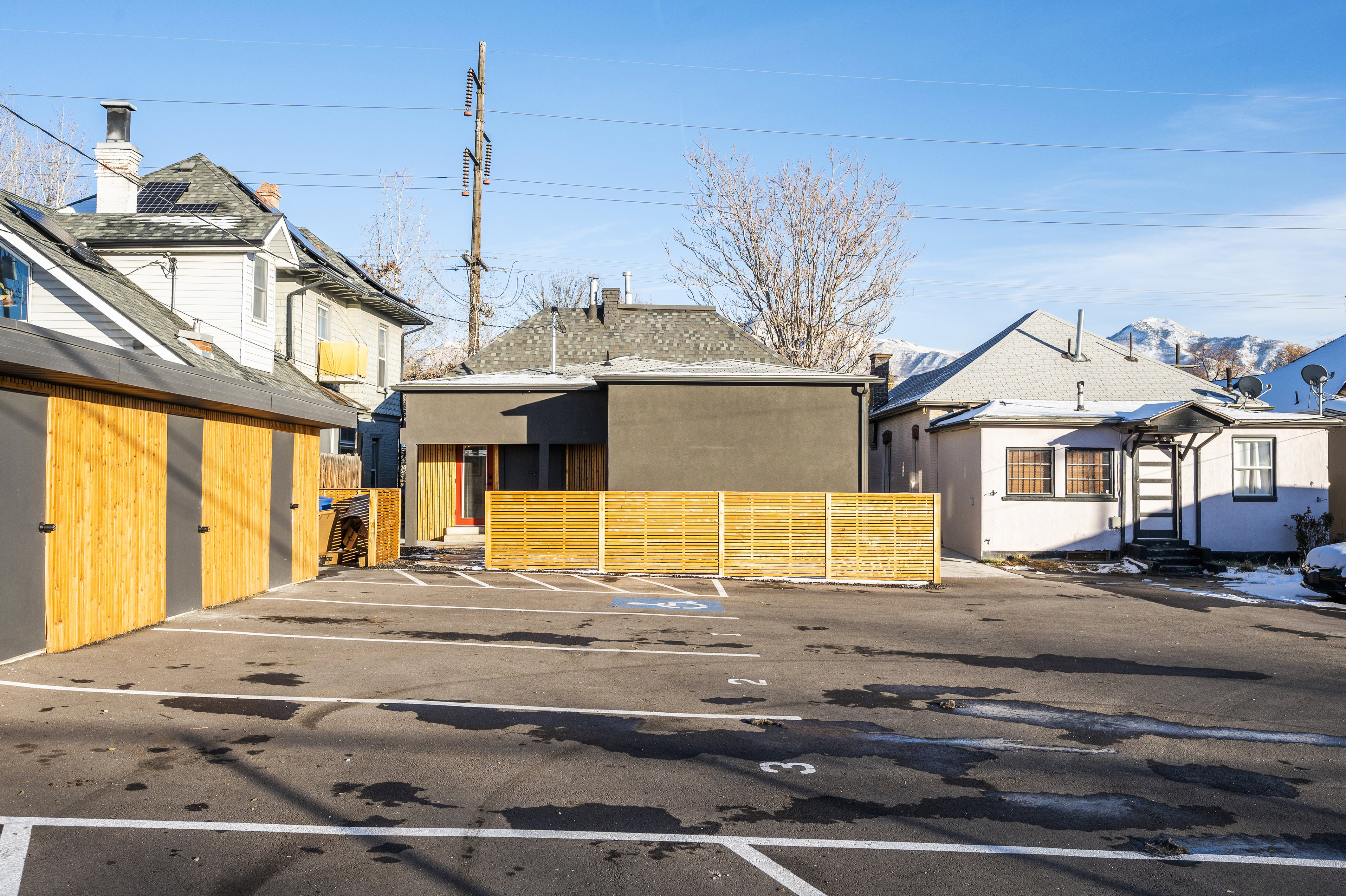 View of front of house featuring uncovered parking and stucco siding