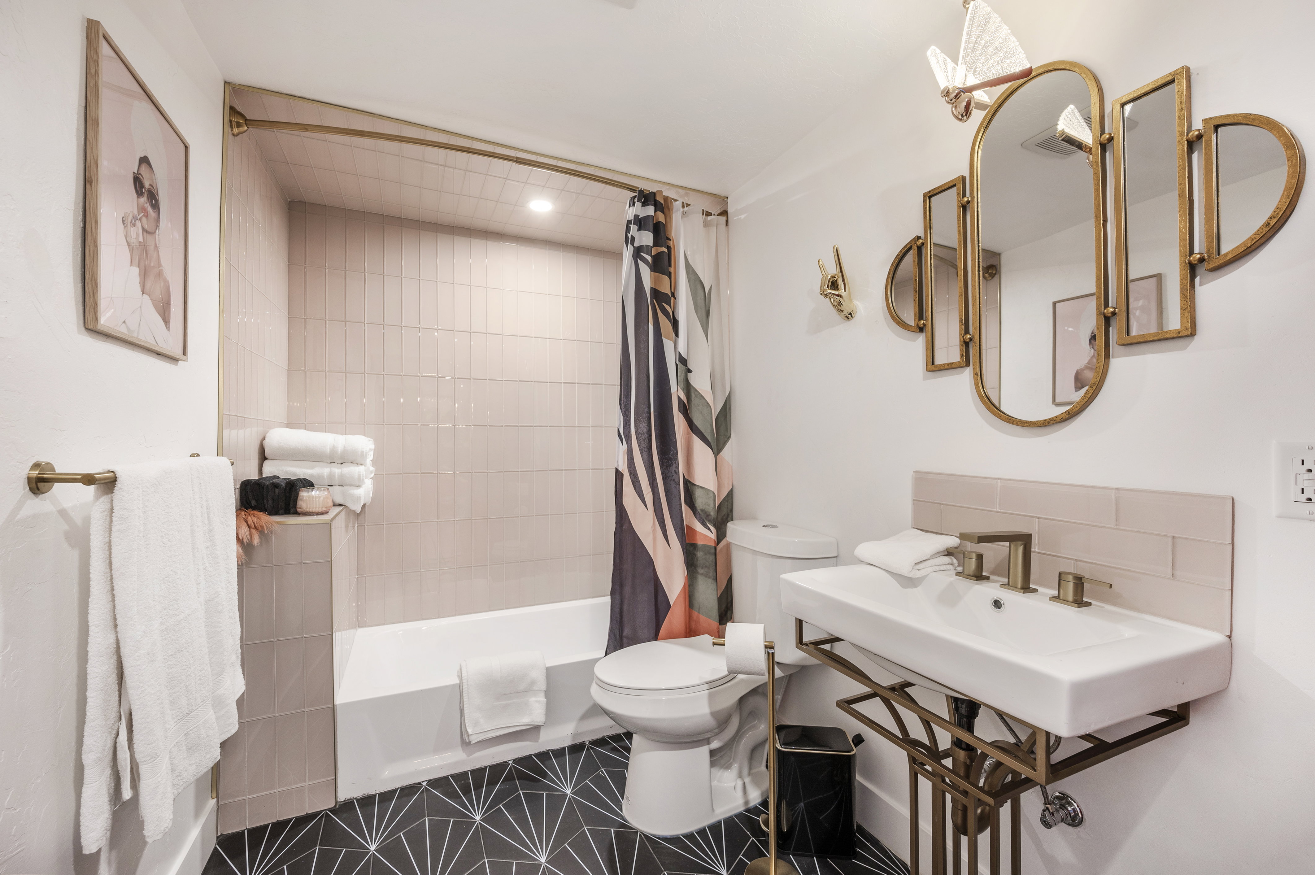 Bathroom featuring shower / tub combo with curtain and toilet