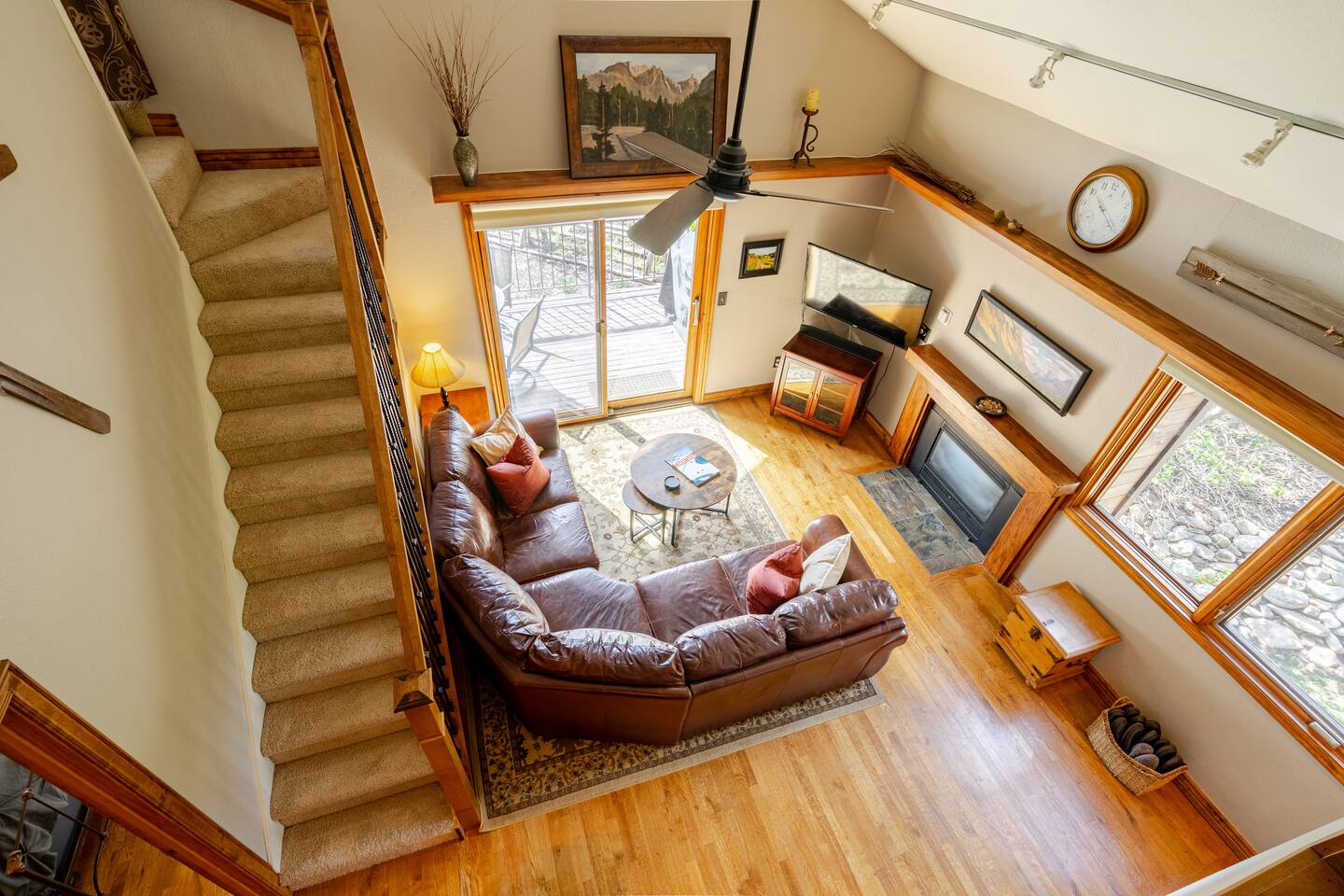 View into lower level from loft bedroom