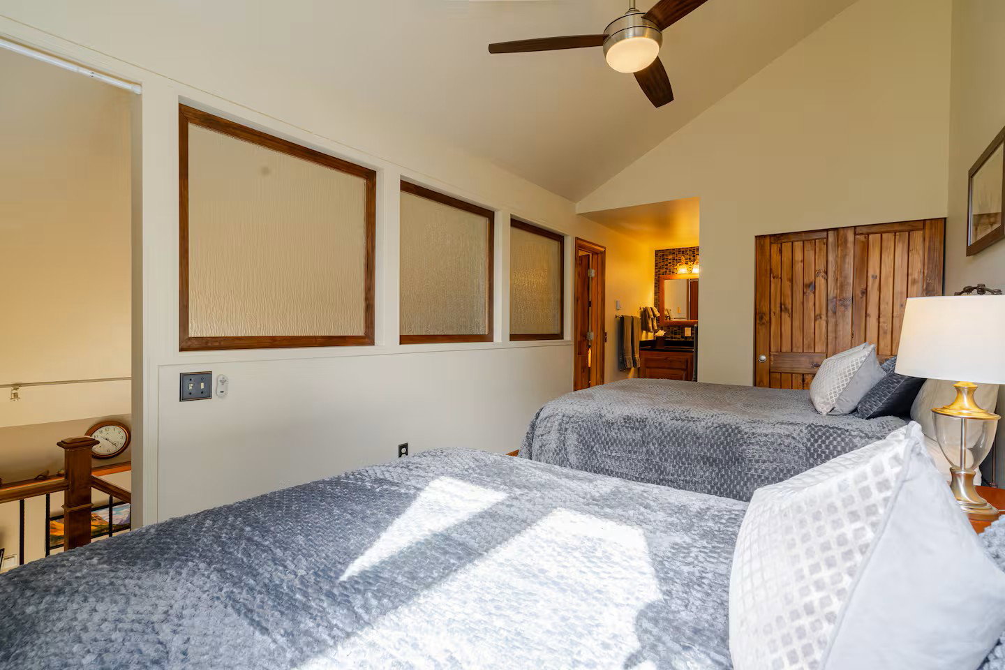 Second level bedroom with custom privacy windows