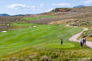 View of community featuring golf course view and a mountain view
