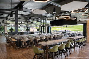 Dining space featuring a high ceiling