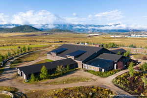 Aerial view of sparsely populated area featuring a mountain backdrop