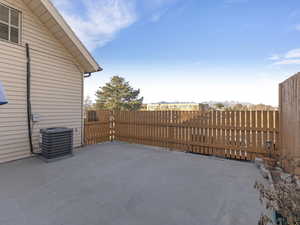 Fenced backyard featuring a patio area