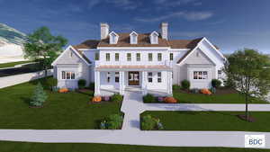 View of front facade featuring a chimney, covered porch, a front yard, and brick siding