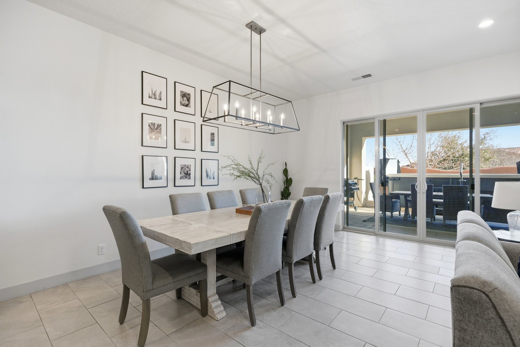 Dining area featuring suspended lighting and baseboards
