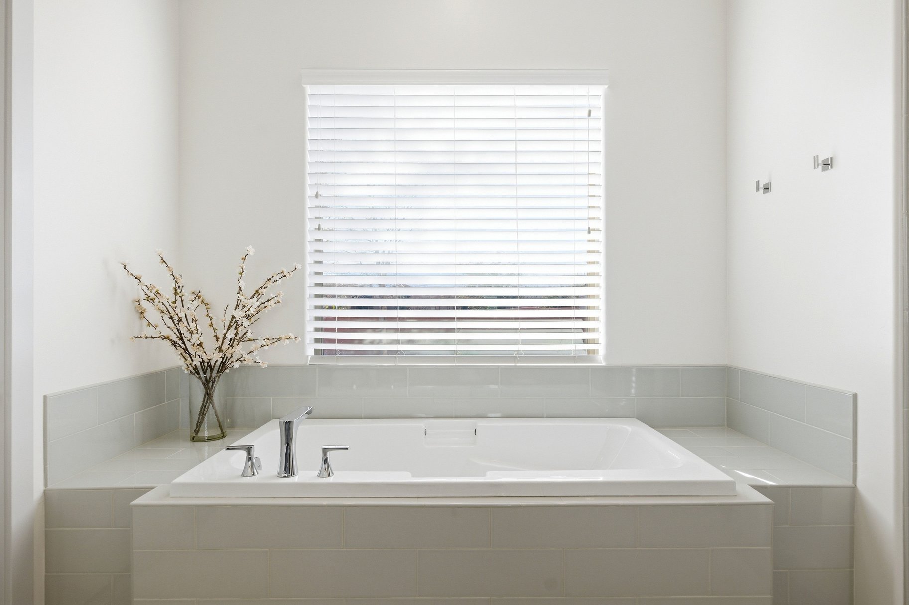Full bathroom with a garden tub