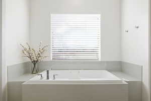 Full bathroom with a garden tub